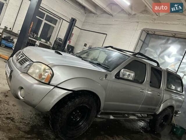 Серый Ниссан Навара, объемом двигателя 2.5 л и пробегом 171 тыс. км за 5937 $, фото 1 на Automoto.ua