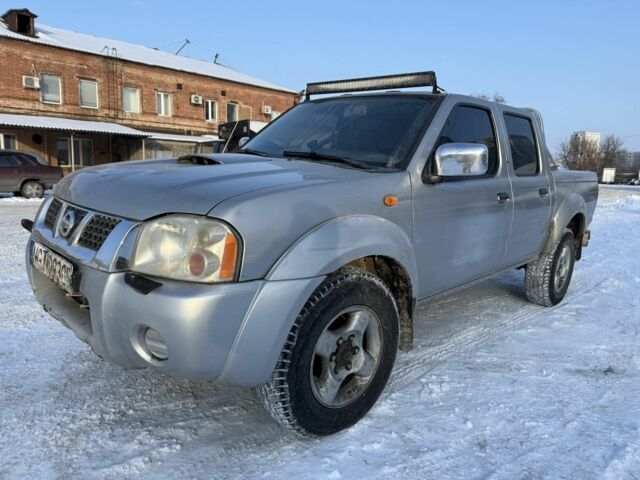 Сірий Ніссан Навара, об'ємом двигуна 2.5 л та пробігом 234 тис. км за 5500 $, фото 1 на Automoto.ua