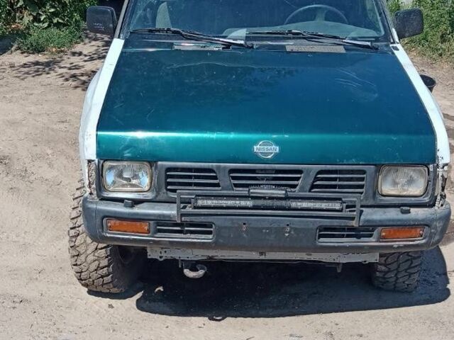 Синій Ніссан Навара, об'ємом двигуна 2.5 л та пробігом 50 тис. км за 1800 $, фото 1 на Automoto.ua