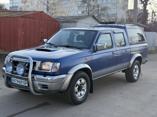 Синий Ниссан Навара, объемом двигателя 2.5 л и пробегом 250 тыс. км за 4200 $, фото 1 на Automoto.ua