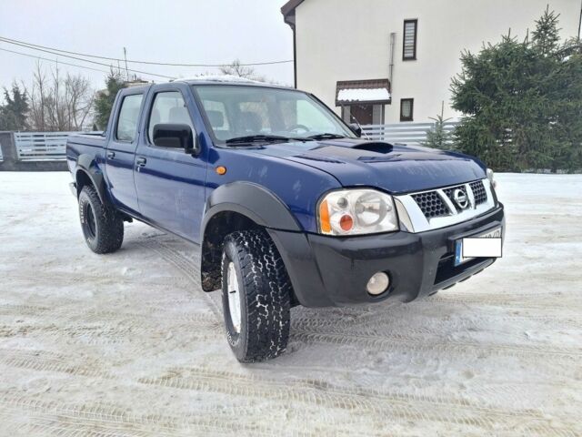 Синий Ниссан Навара, объемом двигателя 2.5 л и пробегом 150 тыс. км за 2800 $, фото 1 на Automoto.ua