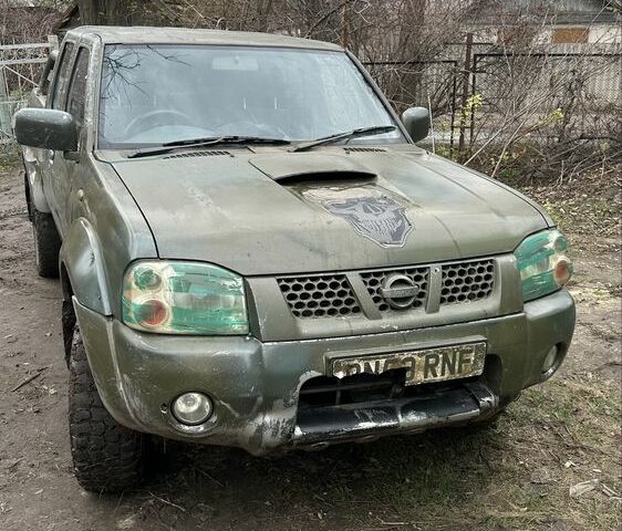 Синий Ниссан Навара, объемом двигателя 2.5 л и пробегом 281 тыс. км за 4000 $, фото 1 на Automoto.ua