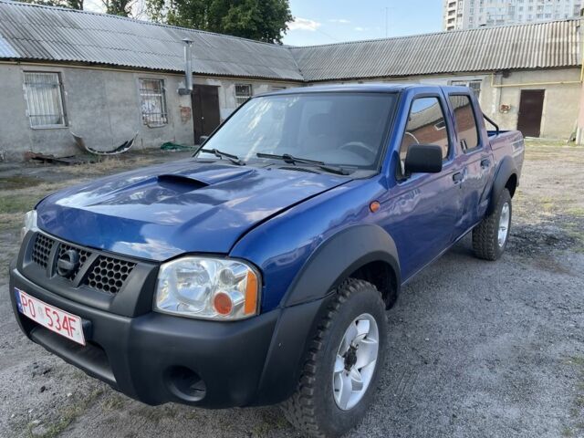 Синій Ніссан Навара, об'ємом двигуна 2.5 л та пробігом 260 тис. км за 4027 $, фото 1 на Automoto.ua