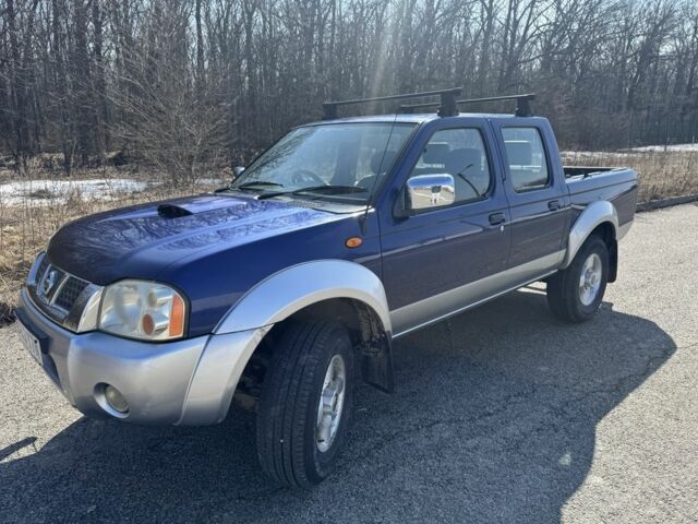 Синий Ниссан Навара, объемом двигателя 2.5 л и пробегом 122 тыс. км за 5200 $, фото 1 на Automoto.ua