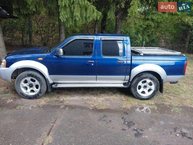 Синій Ніссан Навара, об'ємом двигуна 2.5 л та пробігом 93 тис. км за 6800 $, фото 1 на Automoto.ua