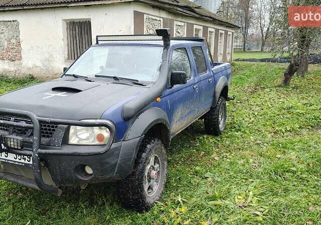 Синій Ніссан Навара, об'ємом двигуна 2.5 л та пробігом 316 тис. км за 7246 $, фото 1 на Automoto.ua