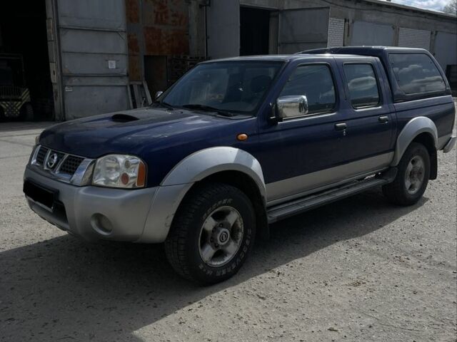 Синій Ніссан Навара, об'ємом двигуна 2.5 л та пробігом 165 тис. км за 4800 $, фото 1 на Automoto.ua