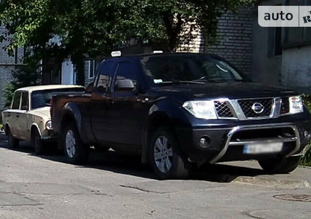 Синий Ниссан Навара, объемом двигателя 2.49 л и пробегом 338 тыс. км за 11900 $, фото 1 на Automoto.ua