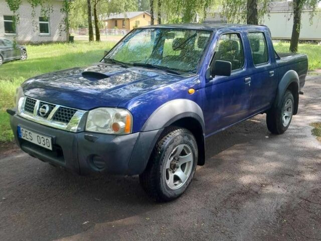 Синій Ніссан Навара, об'ємом двигуна 2.5 л та пробігом 182 тис. км за 6300 $, фото 1 на Automoto.ua