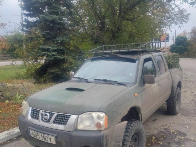 Зеленый Ниссан Навара, объемом двигателя 2.5 л и пробегом 300 тыс. км за 3500 $, фото 1 на Automoto.ua