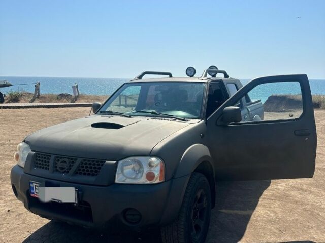 Зелений Ніссан Навара, об'ємом двигуна 2.5 л та пробігом 235 тис. км за 5444 $, фото 1 на Automoto.ua