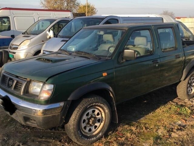 Зелений Ніссан Навара, об'ємом двигуна 2.5 л та пробігом 220 тис. км за 1741 $, фото 1 на Automoto.ua