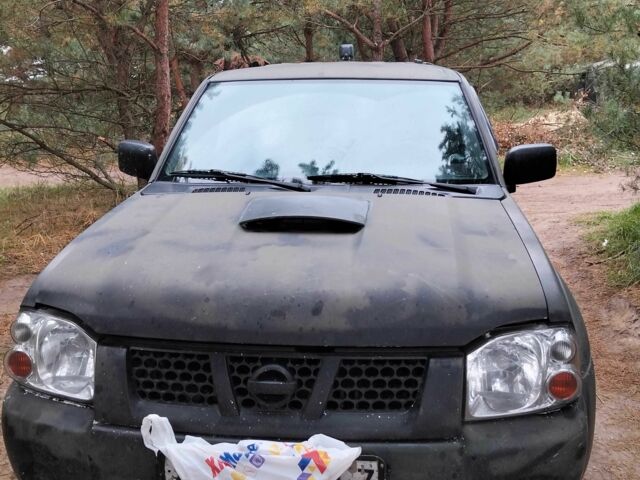 Зеленый Ниссан Навара, объемом двигателя 2.5 л и пробегом 261 тыс. км за 5001 $, фото 1 на Automoto.ua