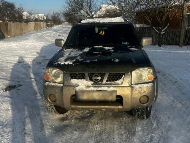 Зелений Ніссан Навара, об'ємом двигуна 2.5 л та пробігом 250 тис. км за 7000 $, фото 1 на Automoto.ua