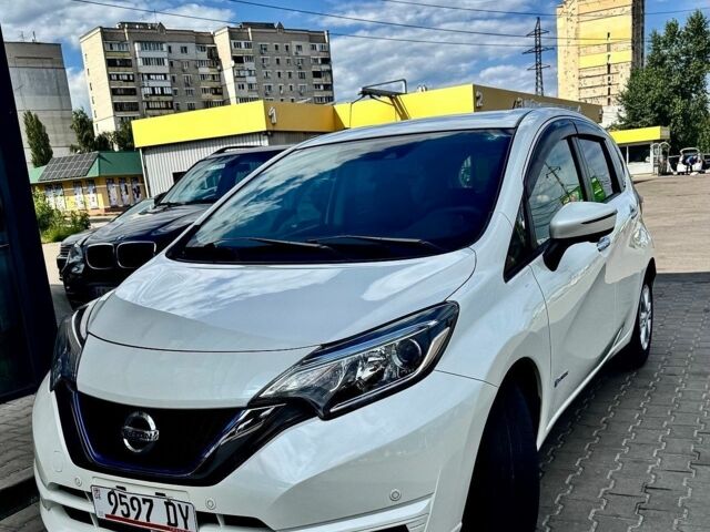 Білий Ніссан Ноут, об'ємом двигуна 1.2 л та пробігом 55 тис. км за 11600 $, фото 1 на Automoto.ua