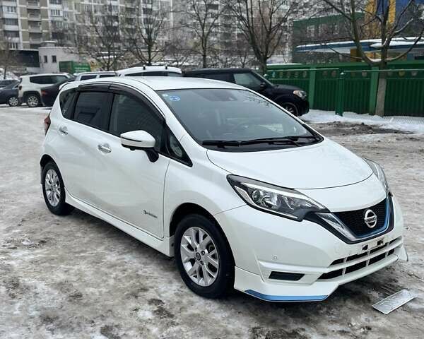 Білий Ніссан Ноут, об'ємом двигуна 1.2 л та пробігом 57 тис. км за 12900 $, фото 1 на Automoto.ua