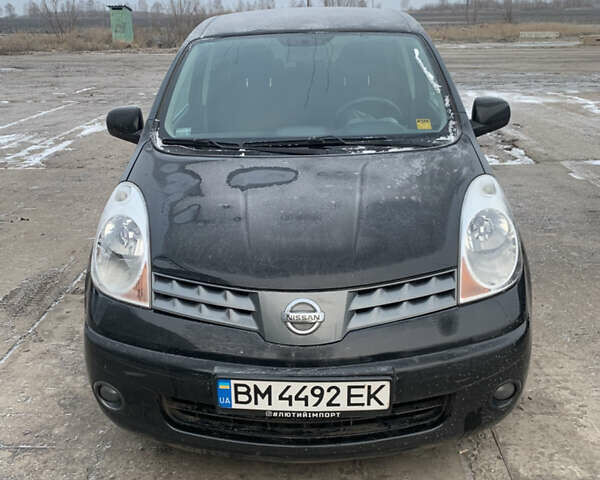 Черный Ниссан Ноут, объемом двигателя 1.4 л и пробегом 186 тыс. км за 6000 $, фото 1 на Automoto.ua