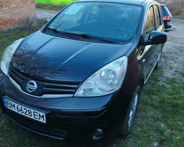Черный Ниссан Ноут, объемом двигателя 1.4 л и пробегом 190 тыс. км за 6100 $, фото 1 на Automoto.ua