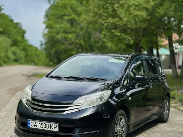 Черный Ниссан Ноут, объемом двигателя 1.2 л и пробегом 170 тыс. км за 7200 $, фото 1 на Automoto.ua