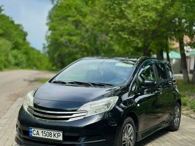 Чорний Ніссан Ноут, об'ємом двигуна 1.2 л та пробігом 173 тис. км за 7550 $, фото 1 на Automoto.ua