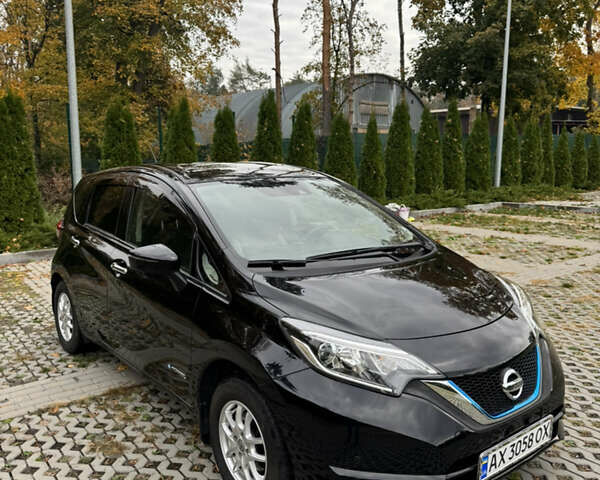 Черный Ниссан Ноут, объемом двигателя 1.2 л и пробегом 59 тыс. км за 12100 $, фото 1 на Automoto.ua
