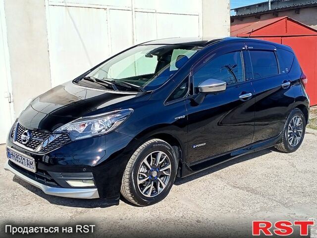 Чорний Ніссан Ноут, об'ємом двигуна 1.2 л та пробігом 47 тис. км за 13800 $, фото 1 на Automoto.ua