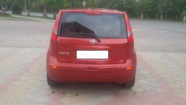 Червоний Ніссан Ноут, об'ємом двигуна 1.4 л та пробігом 125 тис. км за 6900 $, фото 1 на Automoto.ua