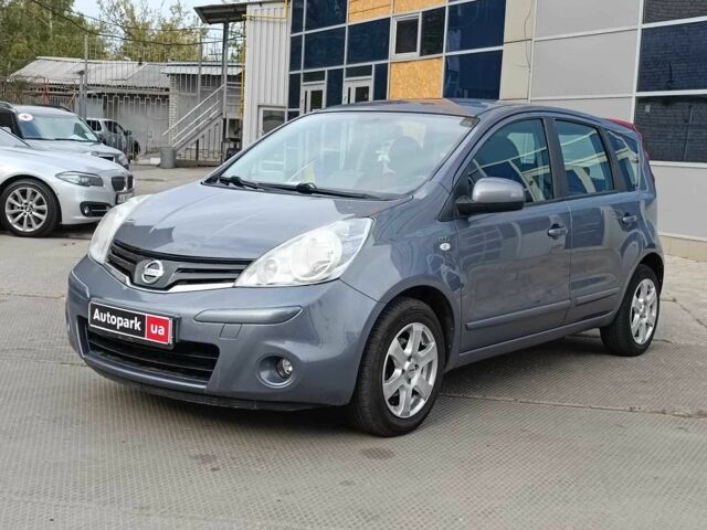 Червоний Ніссан Ноут, об'ємом двигуна 1.4 л та пробігом 254 тис. км за 5490 $, фото 1 на Automoto.ua
