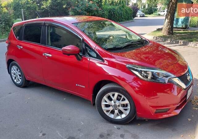 Червоний Ніссан Ноут, об'ємом двигуна 1.2 л та пробігом 58 тис. км за 11950 $, фото 1 на Automoto.ua