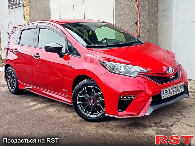 Красный Ниссан Ноут, объемом двигателя 1.2 л и пробегом 80 тыс. км за 13900 $, фото 1 на Automoto.ua