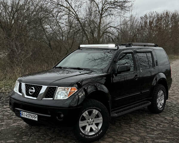 Черный Ниссан Патфайндер, объемом двигателя 4 л и пробегом 183 тыс. км за 9400 $, фото 1 на Automoto.ua