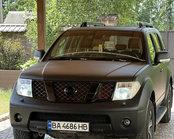 Чорний Ніссан Патфайндер, об'ємом двигуна 2.49 л та пробігом 313 тис. км за 11000 $, фото 1 на Automoto.ua