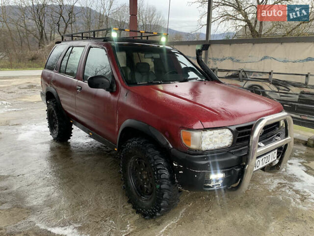 Червоний Ніссан Патфайндер, об'ємом двигуна 2.5 л та пробігом 350 тис. км за 3850 $, фото 1 на Automoto.ua