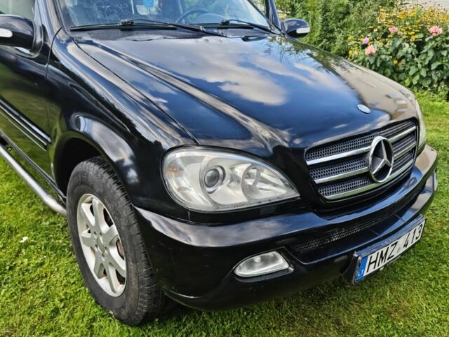 Серый Ниссан Патфайндер, объемом двигателя 3 л и пробегом 360 тыс. км за 3495 $, фото 1 на Automoto.ua