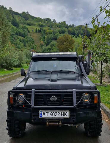 Черный Ниссан Патрол, объемом двигателя 2.8 л и пробегом 320 тыс. км за 10500 $, фото 1 на Automoto.ua