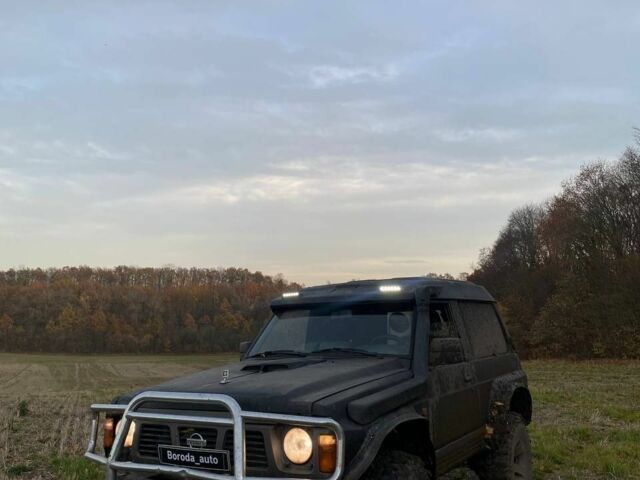 Чорний Ніссан Патрол, об'ємом двигуна 0 л та пробігом 250 тис. км за 5600 $, фото 1 на Automoto.ua