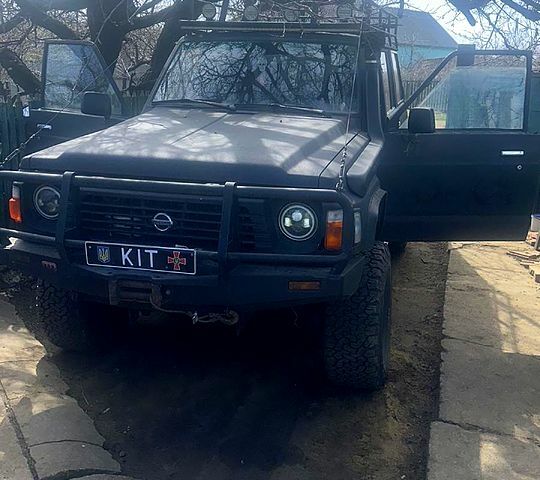 Чорний Ніссан Патрол, об'ємом двигуна 4.2 л та пробігом 0 тис. км за 7500 $, фото 1 на Automoto.ua