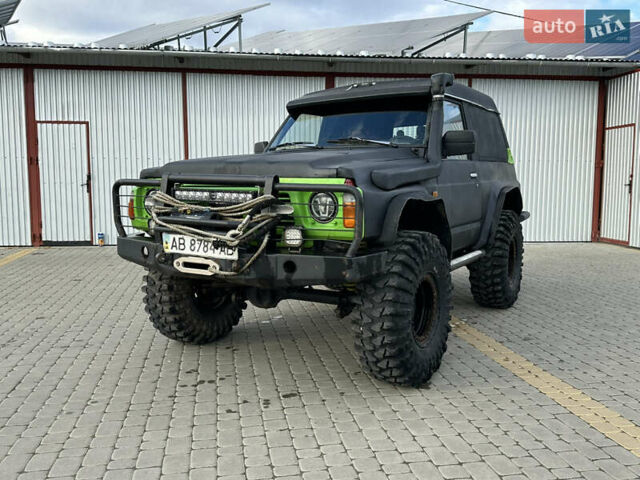 Черный Ниссан Патрол, объемом двигателя 2.8 л и пробегом 300 тыс. км за 12000 $, фото 1 на Automoto.ua