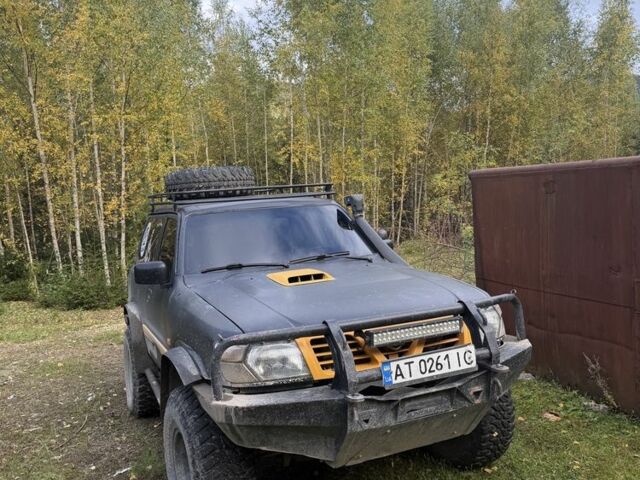 Черный Ниссан Патрол, объемом двигателя 2.8 л и пробегом 306 тыс. км за 15000 $, фото 1 на Automoto.ua
