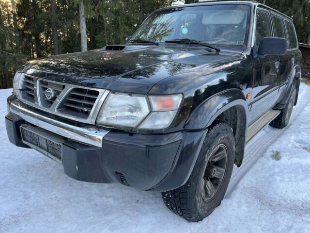 Черный Ниссан Патрол, объемом двигателя 3 л и пробегом 200 тыс. км за 8300 $, фото 1 на Automoto.ua