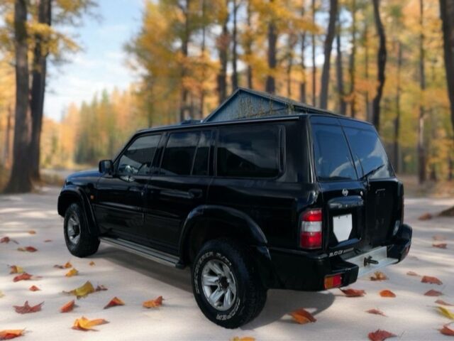 Чорний Ніссан Патрол, об'ємом двигуна 3 л та пробігом 350 тис. км за 7999 $, фото 1 на Automoto.ua