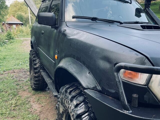 Черный Ниссан Патрол, объемом двигателя 3 л и пробегом 300 тыс. км за 6800 $, фото 1 на Automoto.ua