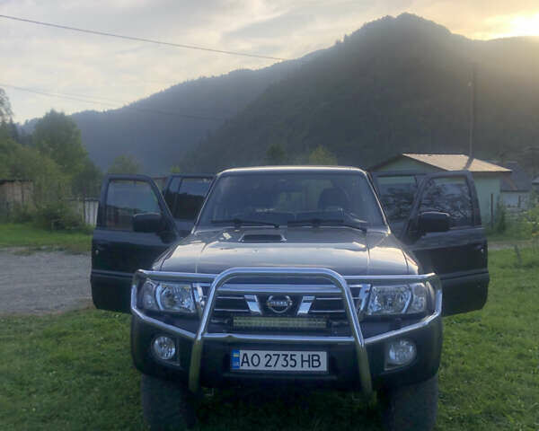 Черный Ниссан Патрол, объемом двигателя 3 л и пробегом 130 тыс. км за 19700 $, фото 1 на Automoto.ua