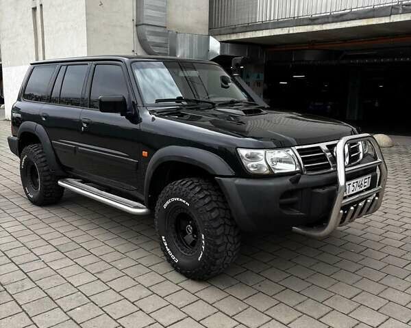 Черный Ниссан Патрол, объемом двигателя 3 л и пробегом 276 тыс. км за 22500 $, фото 1 на Automoto.ua