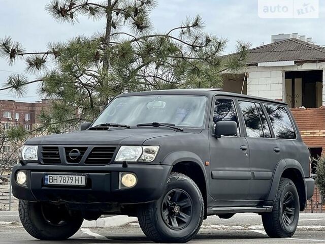 Чорний Ніссан Патрол, об'ємом двигуна 3 л та пробігом 277 тис. км за 11300 $, фото 1 на Automoto.ua