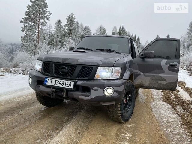 Чорний Ніссан Патрол, об'ємом двигуна 3 л та пробігом 147 тис. км за 20900 $, фото 1 на Automoto.ua