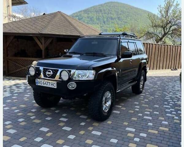 Черный Ниссан Патрол, объемом двигателя 3 л и пробегом 280 тыс. км за 22000 $, фото 1 на Automoto.ua