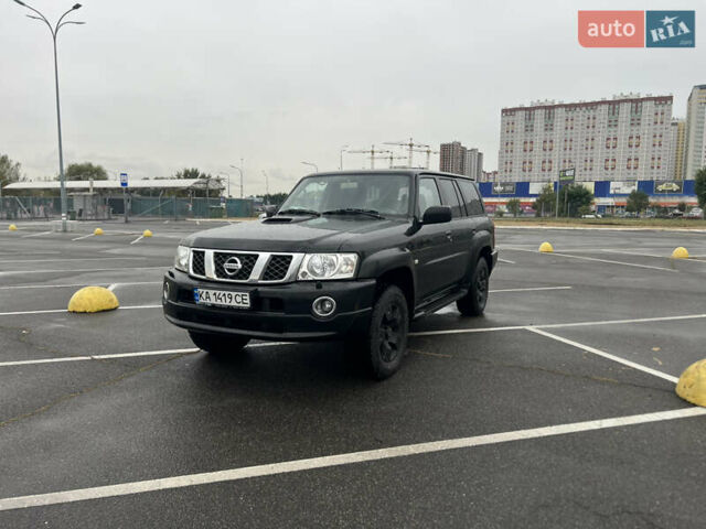 Черный Ниссан Патрол, объемом двигателя 3 л и пробегом 247 тыс. км за 21700 $, фото 1 на Automoto.ua