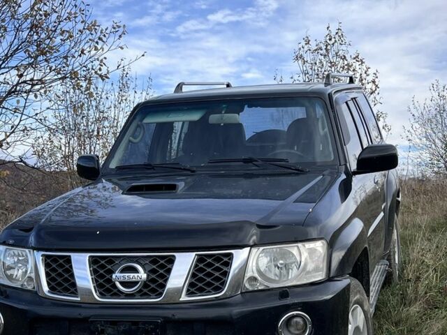 Чорний Ніссан Патрол, об'ємом двигуна 3 л та пробігом 192 тис. км за 9300 $, фото 1 на Automoto.ua