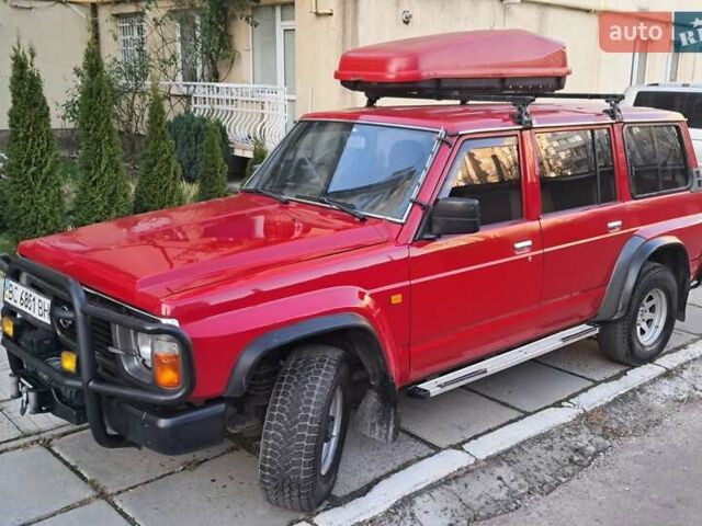 Красный Ниссан Патрол, объемом двигателя 2.8 л и пробегом 413 тыс. км за 12890 $, фото 1 на Automoto.ua